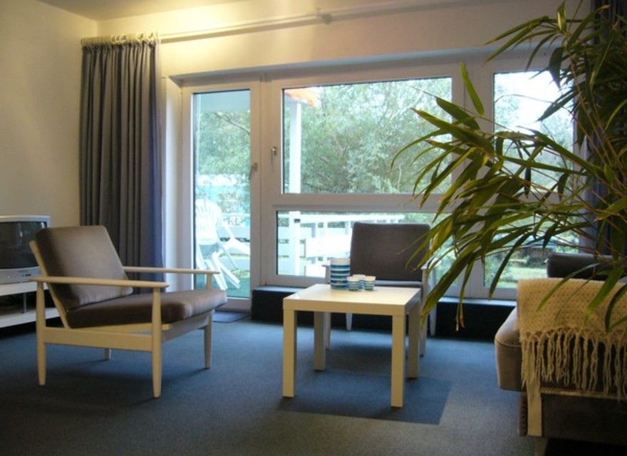 Das Wohnzimmer mit Balkon