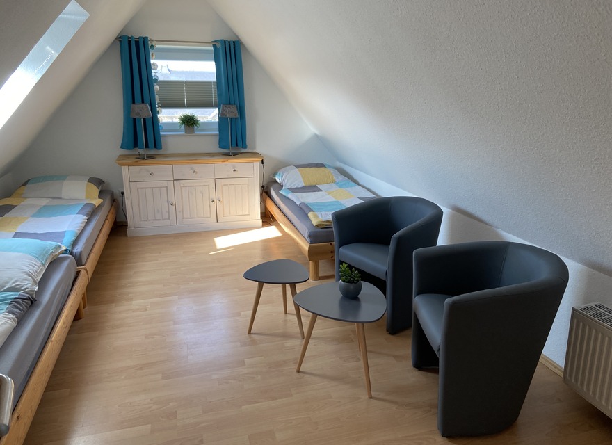 Dreibettzimmer mit Boddenblick