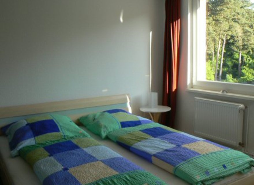 Schlafzimmer mit Waldblick