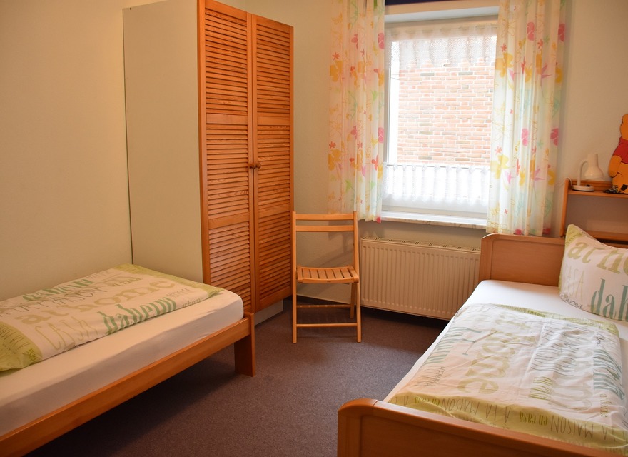 Schlafzimmer mit 2 Betten