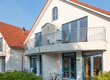 Ansicht mit Terrasse/Balkon