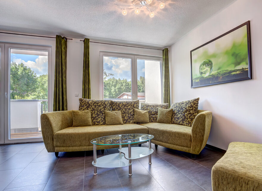 Sitzecke mit Balkonzugang