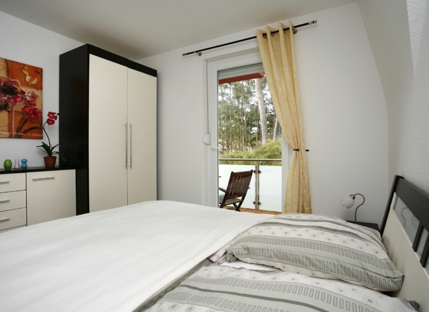Schlafzimmer mit Balkon