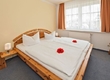 Schlafzimmer mit Doppelbett