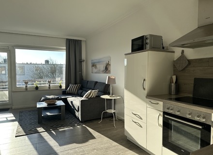 Wohnzimmer mit Küche