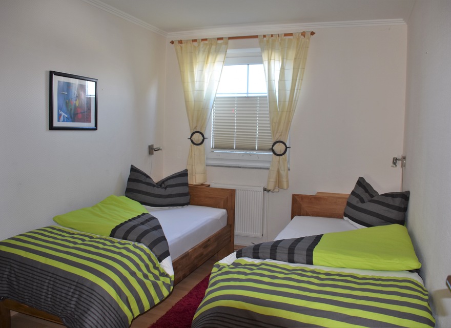 Schlafzimmer mit 2 Betten
