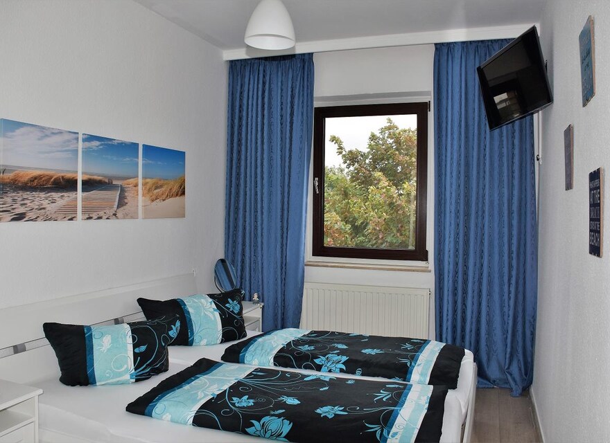 Schlafzimmer mit Doppelbett