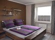 Schlafzimmer mit Doppelbett