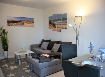 Wohnzimmer mit Schlafsofa