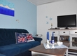 Wohnbereich mit Flat-TV