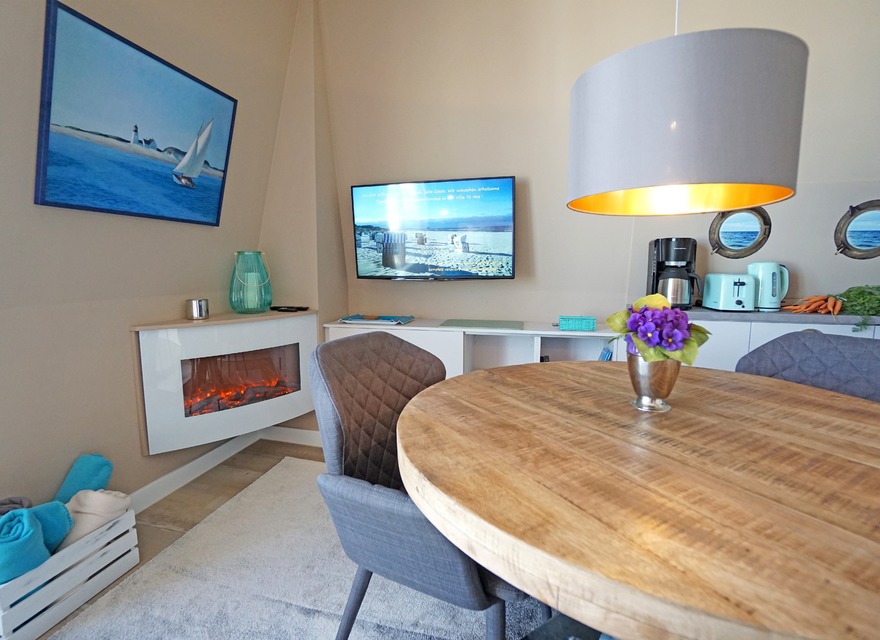 Wohnzimmer mit Elektrokamin un