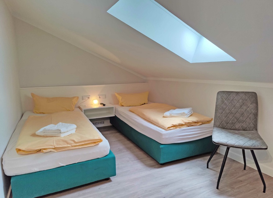 Schlafzimmer mit Einzelbetten